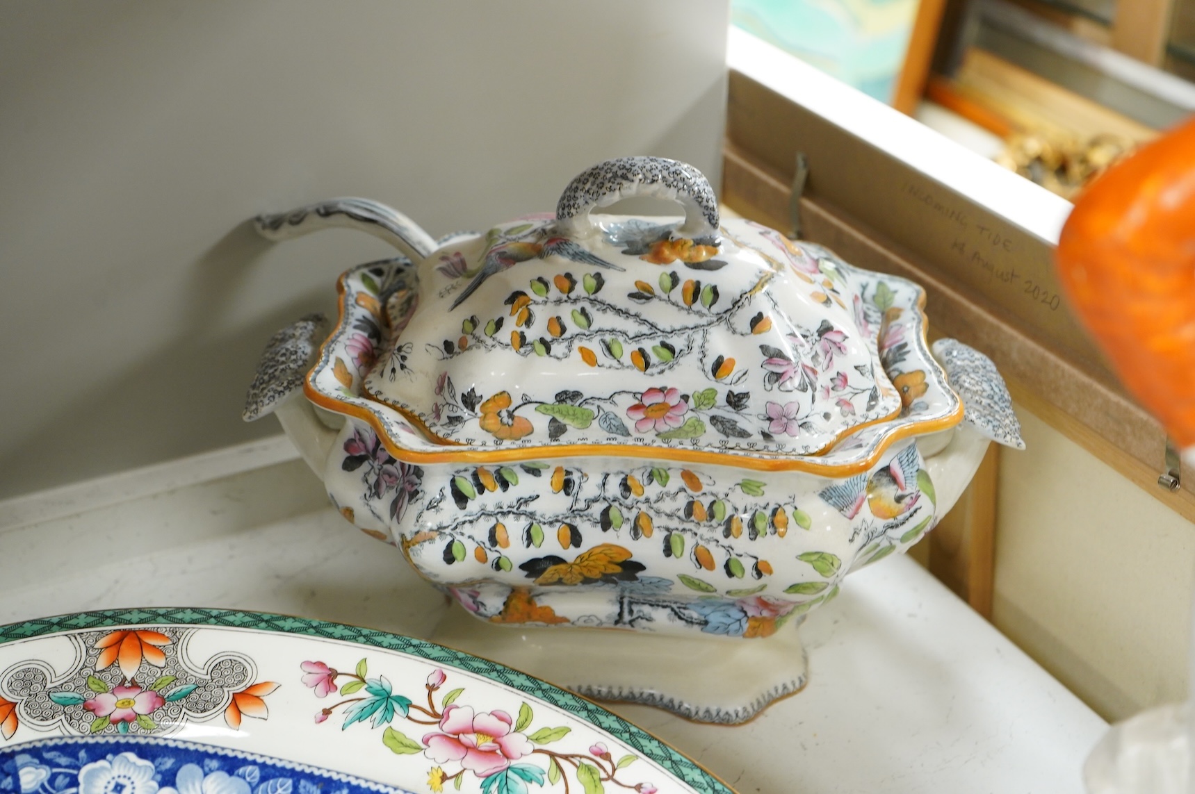 Three 19th century Staffordshire figures, including General Garibaldi, a Staffordshire pottery soup tureen and four serving plates, largest 48cm wide